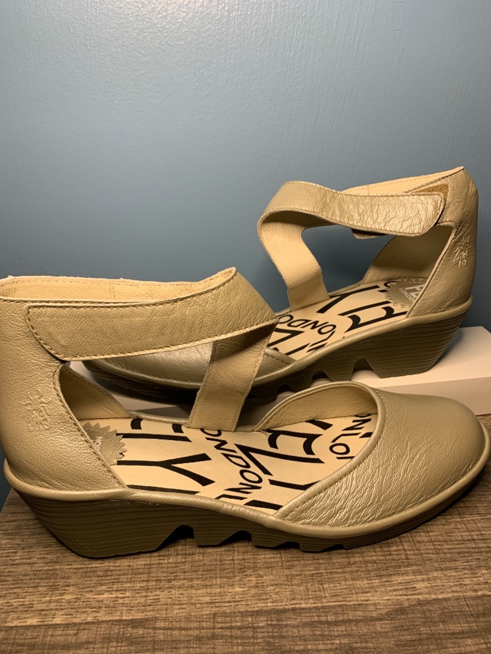 Fly London sandals in muted gold finish